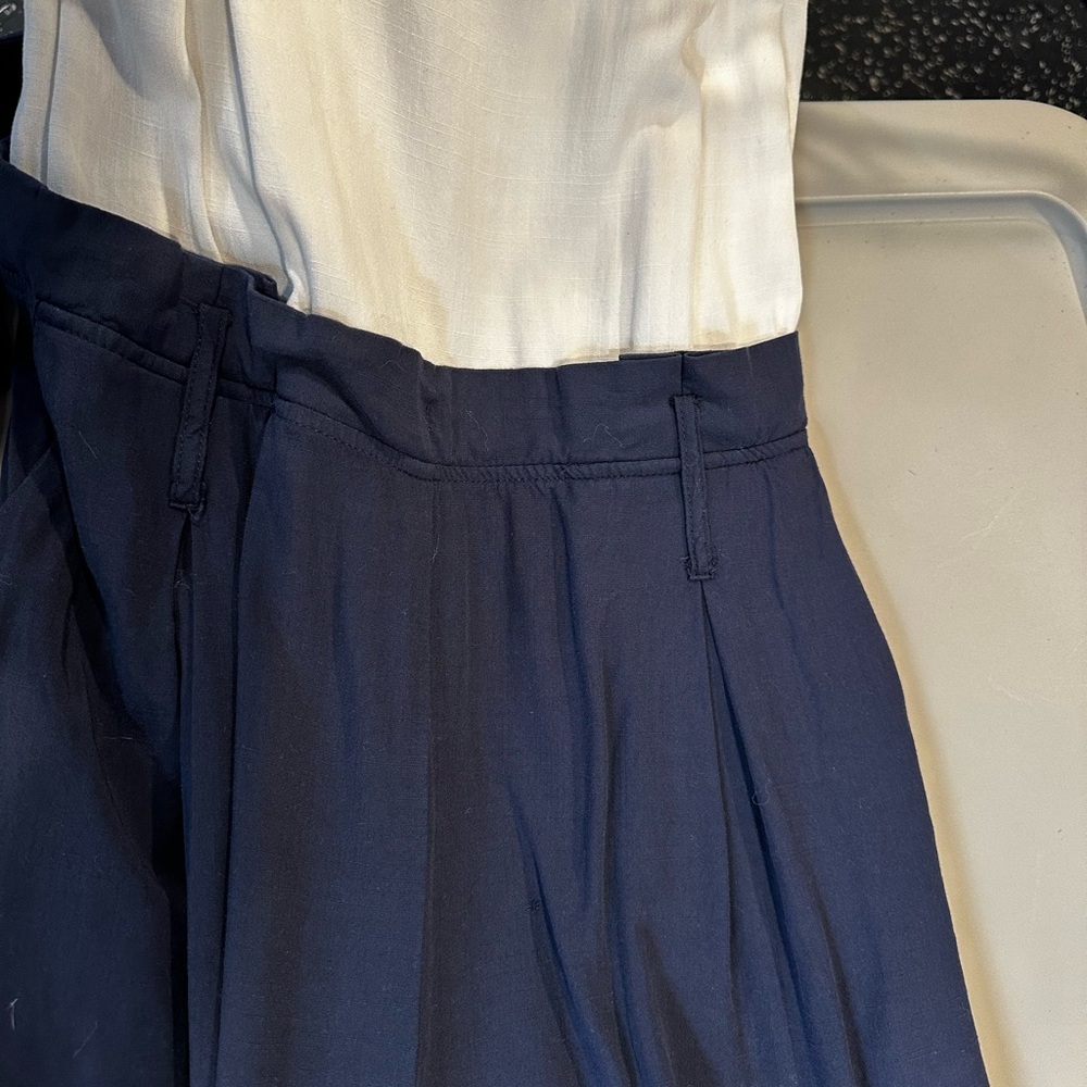 White and navy jumper